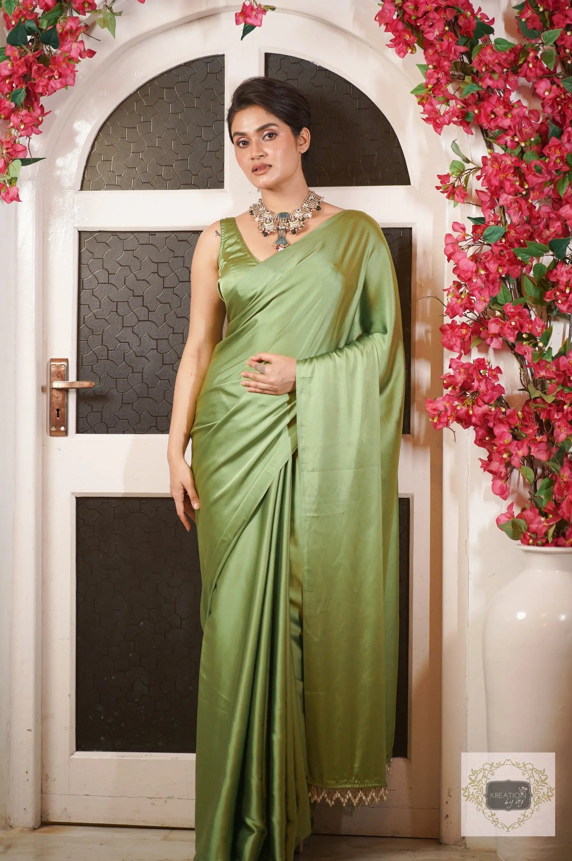 Moss Green Satin Silk Saree with Handmade Tassels on Pallu kreationbykj