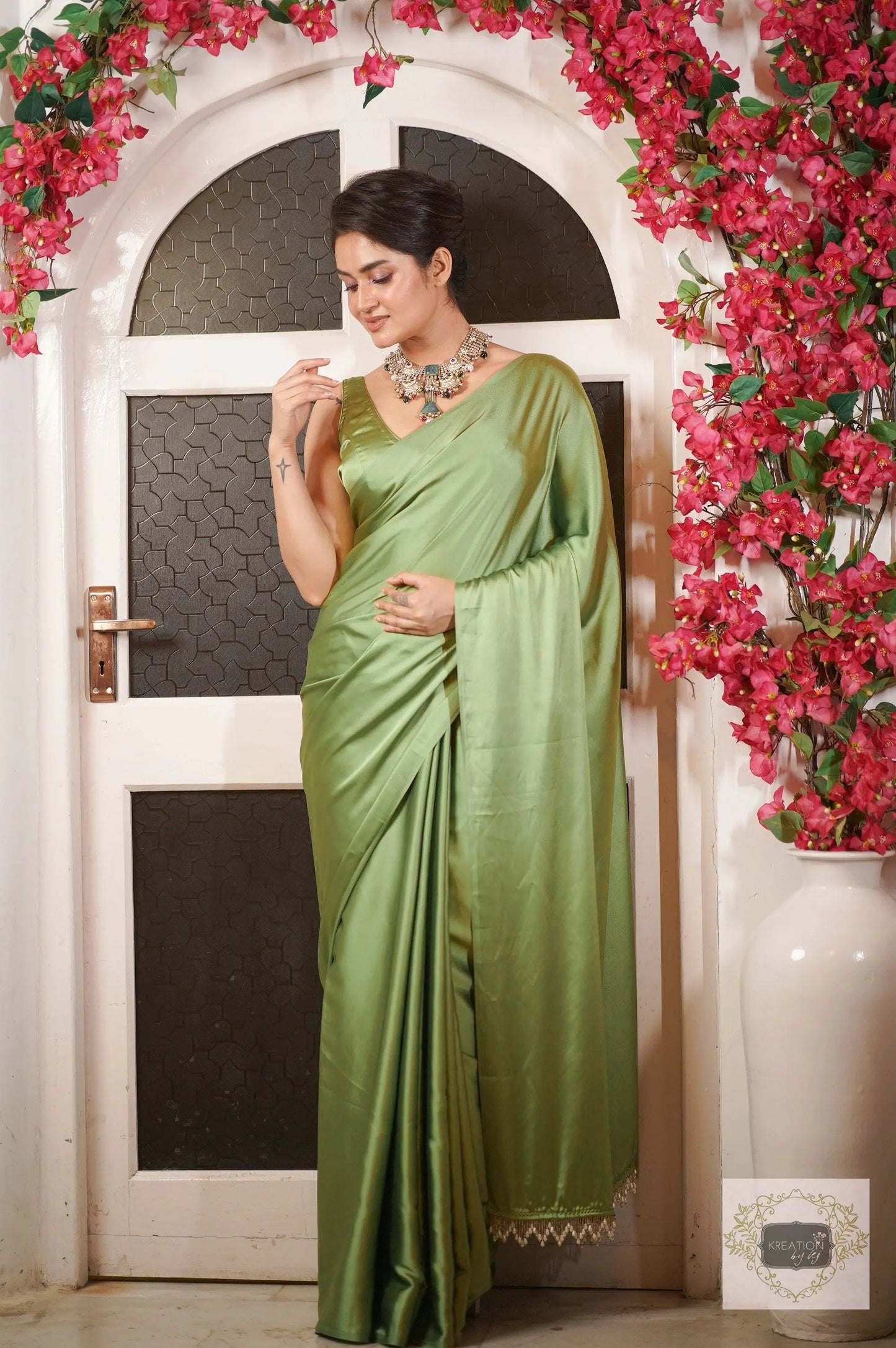 Moss Green Satin Silk Saree with Handmade Tassels on Pallu kreationbykj