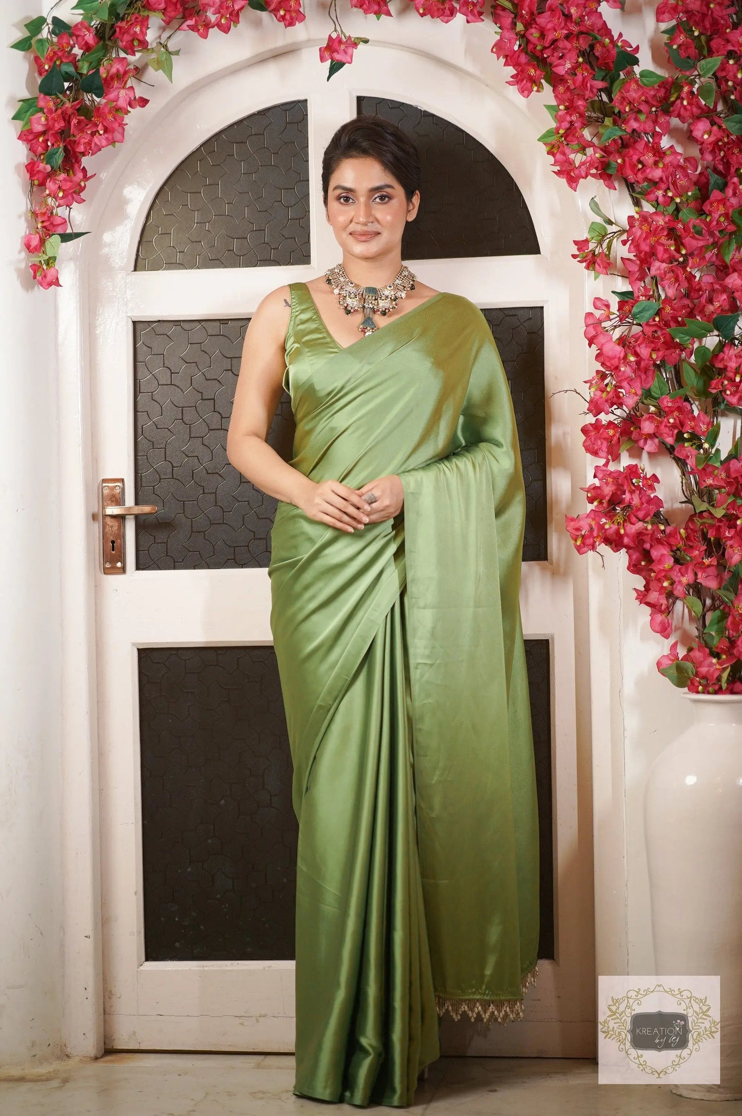 Moss Green Satin Silk Saree with Handmade Tassels on Pallu kreationbykj