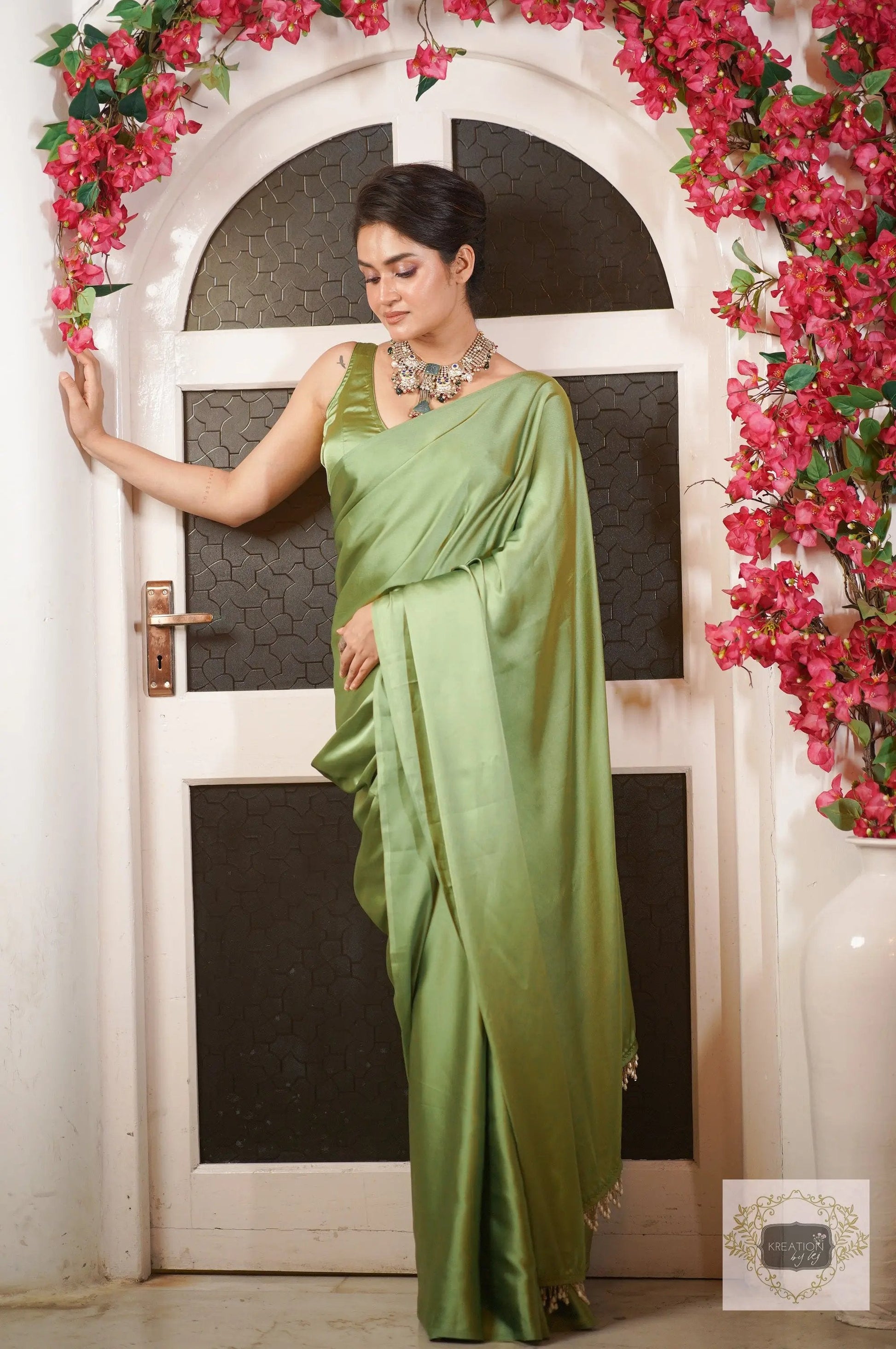 Moss Green Satin Silk Saree with Handmade Tassels on Pallu kreationbykj