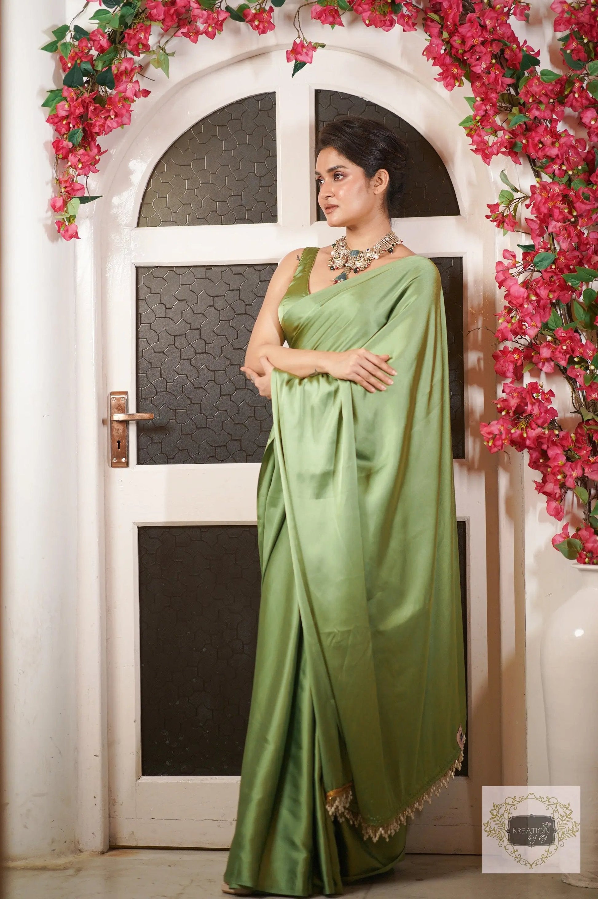 Moss Green Satin Silk Saree with Handmade Tassels on Pallu kreationbykj