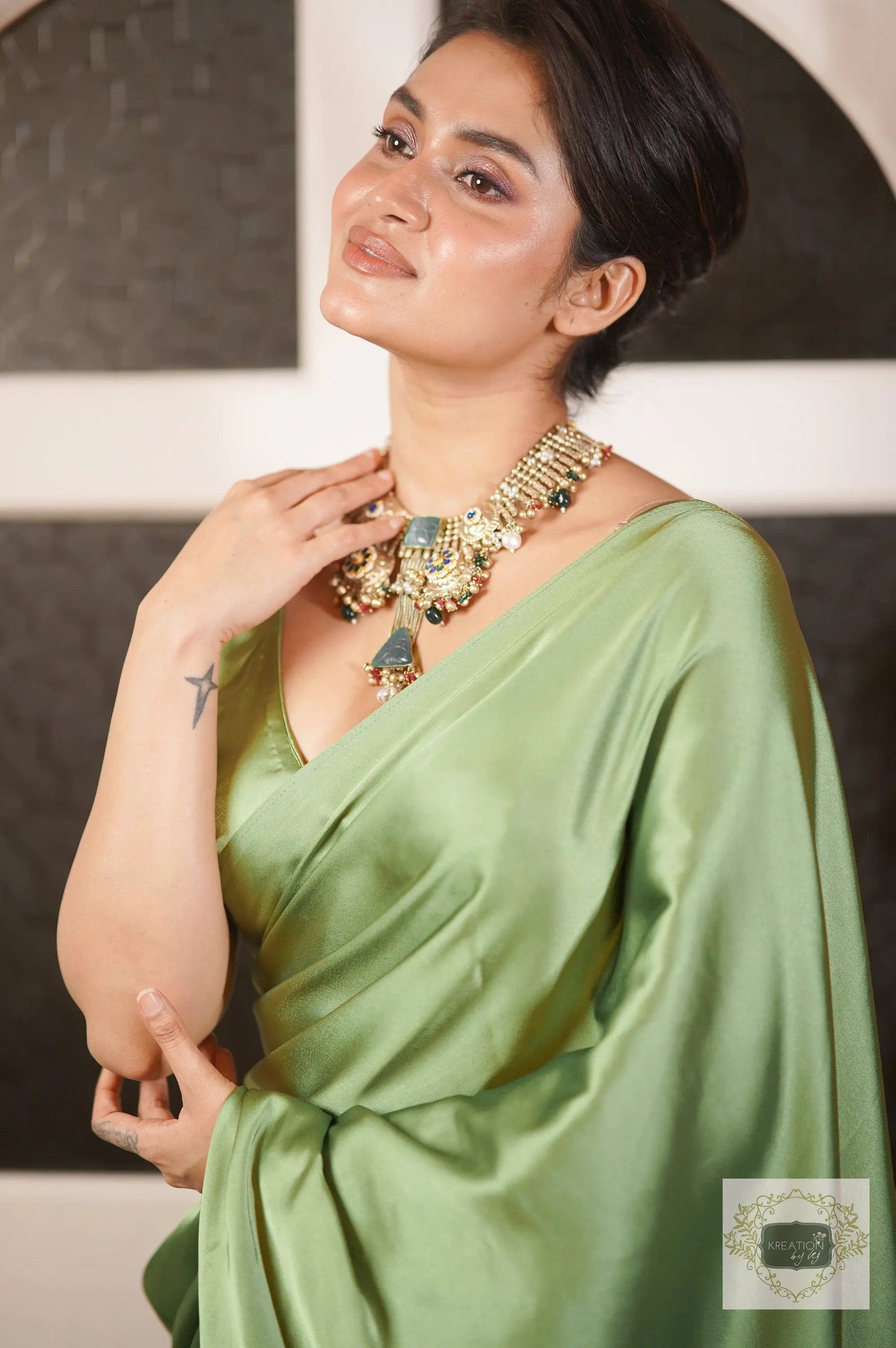 Moss Green Satin Silk Saree with Handmade Tassels on Pallu kreationbykj