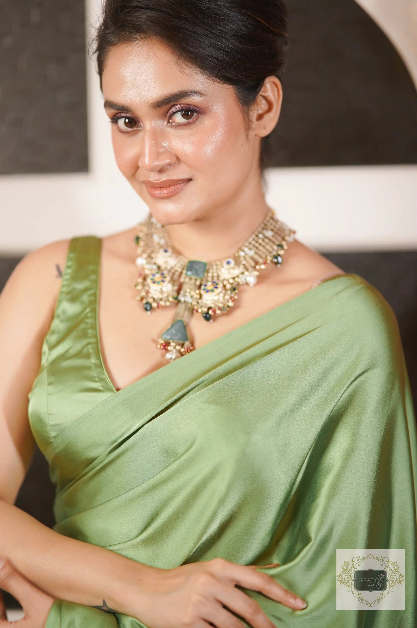 Moss Green Satin Silk Saree with Handmade Tassels on Pallu kreationbykj