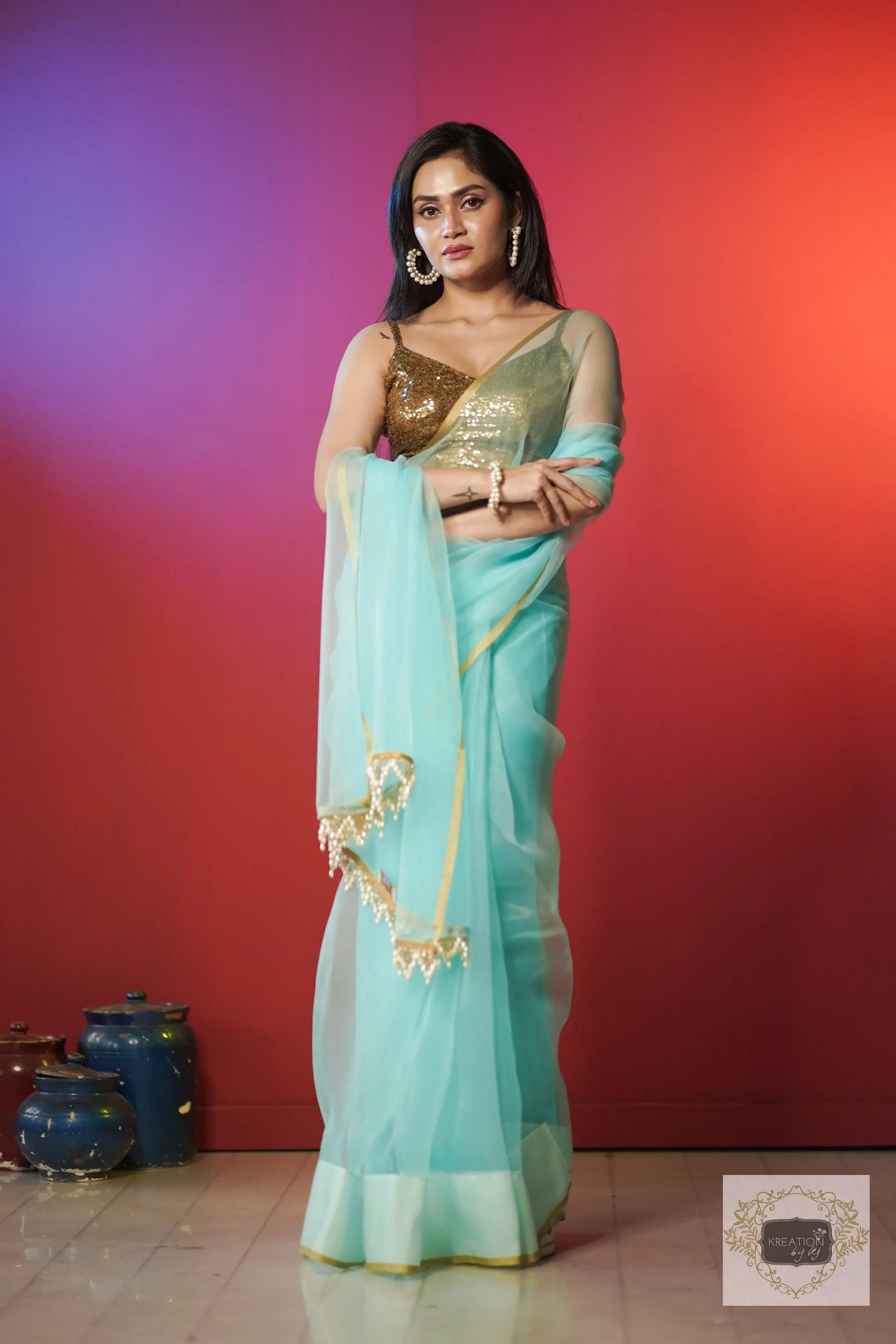 Ice Blue Organza Saree With Handmade Tassels On Pallu kreationbykj