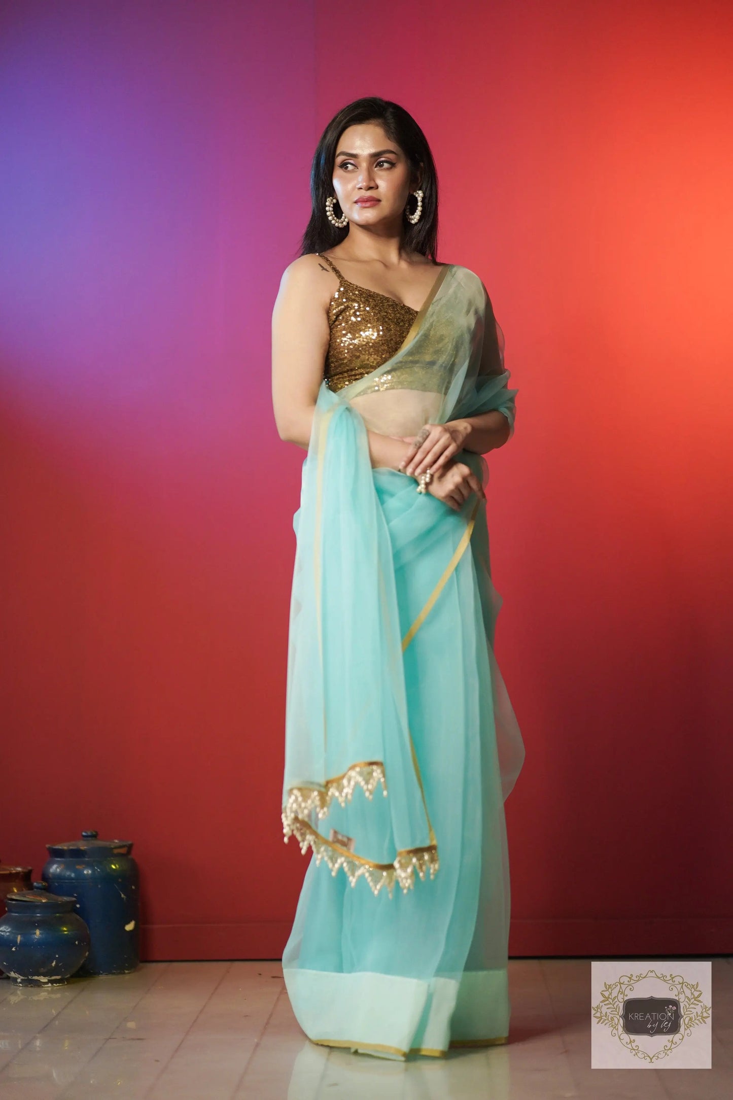 Ice Blue Organza Saree With Handmade Tassels On Pallu kreationbykj