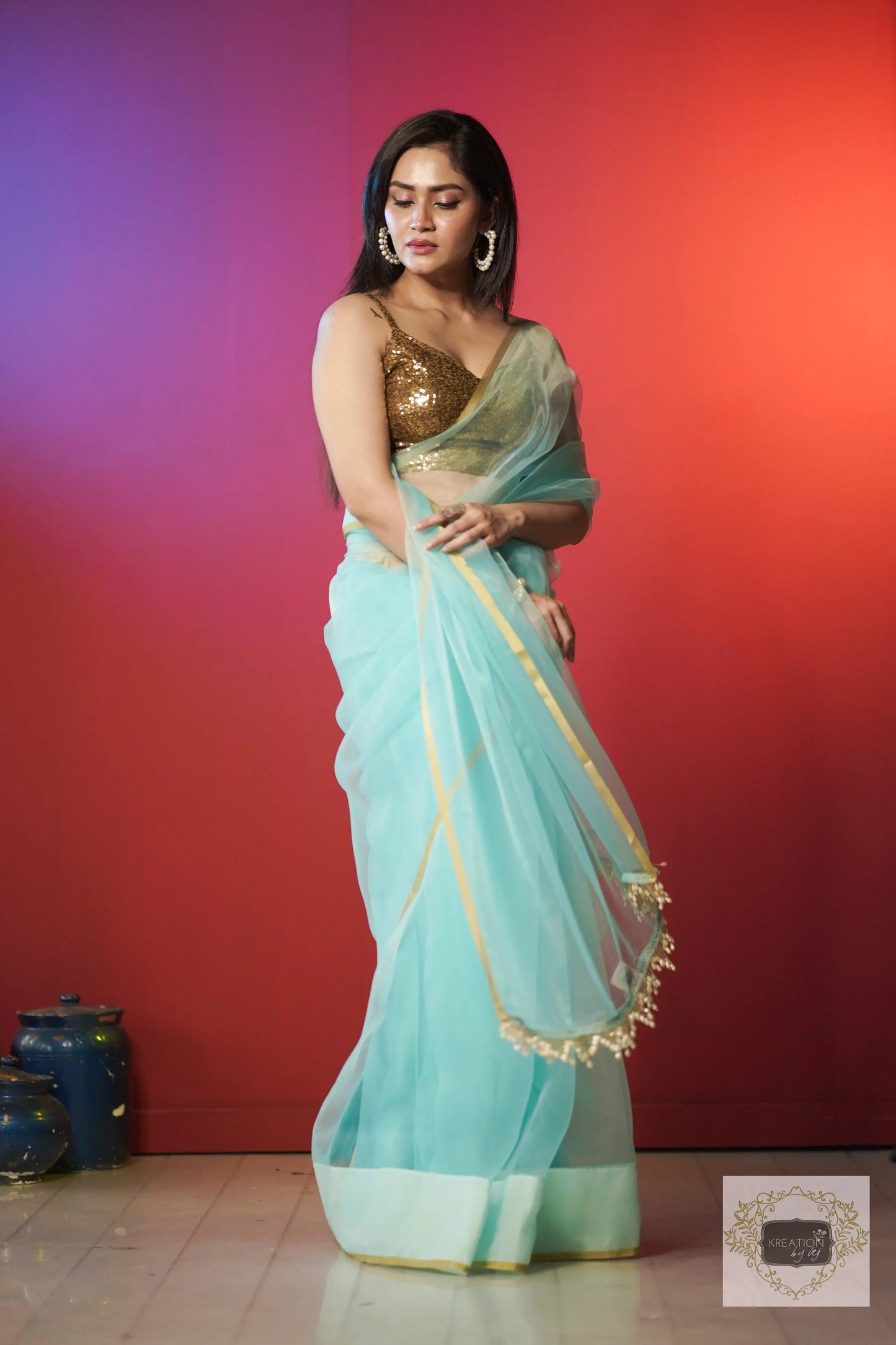 Ice Blue Organza Saree With Handmade Tassels On Pallu kreationbykj