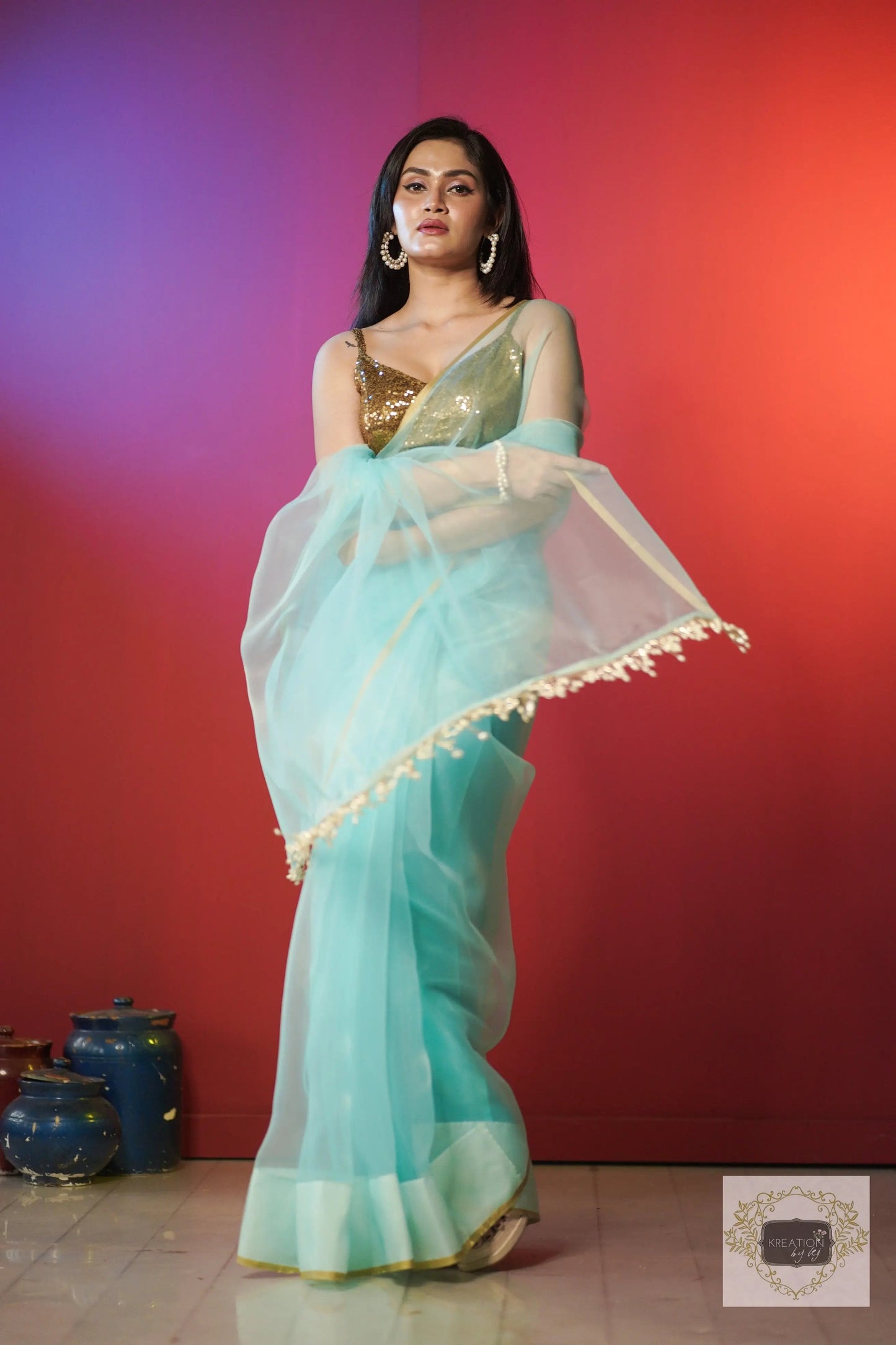 Ice Blue Organza Saree With Handmade Tassels On Pallu kreationbykj