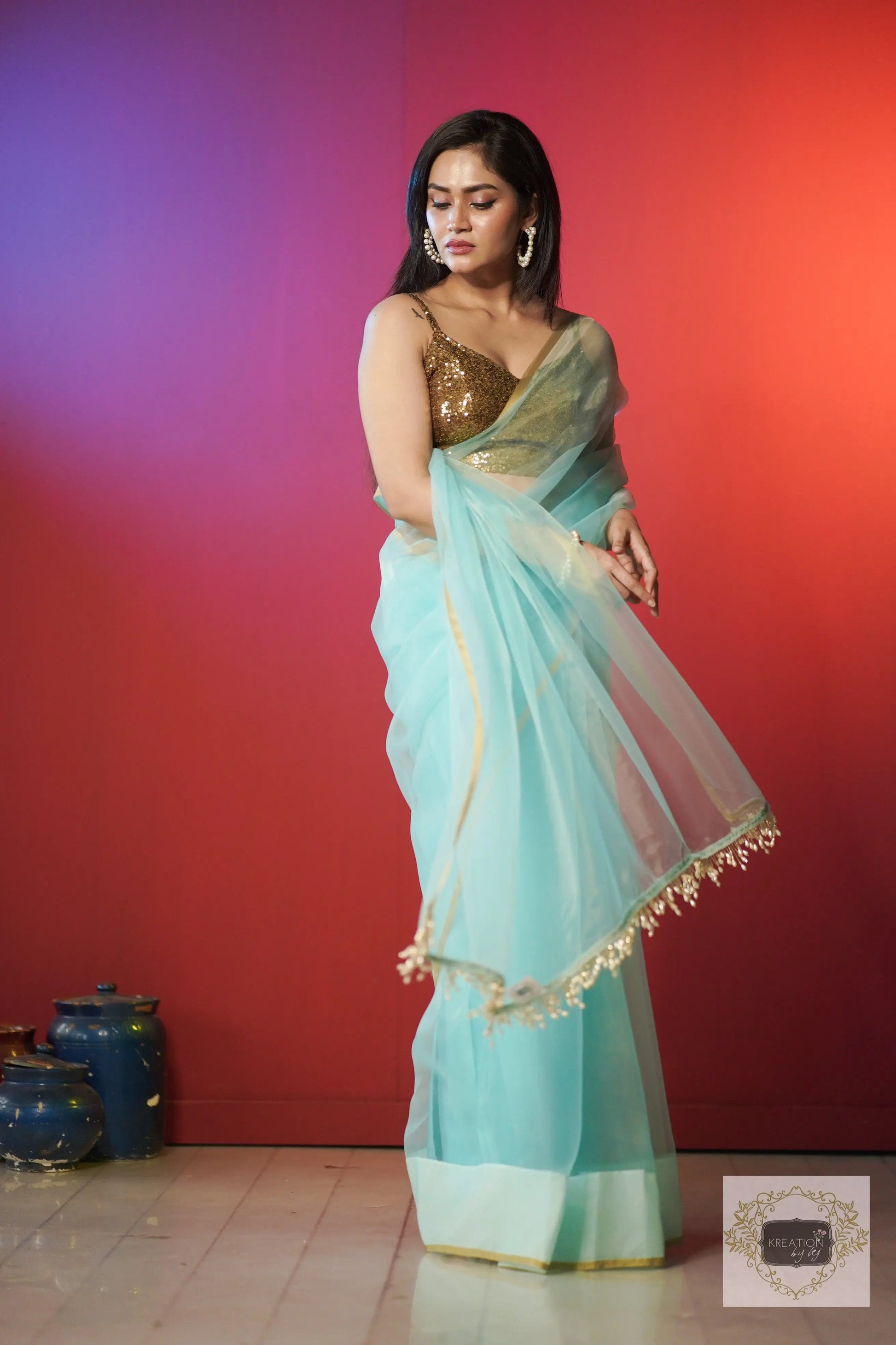 Ice Blue Organza Saree With Handmade Tassels On Pallu kreationbykj