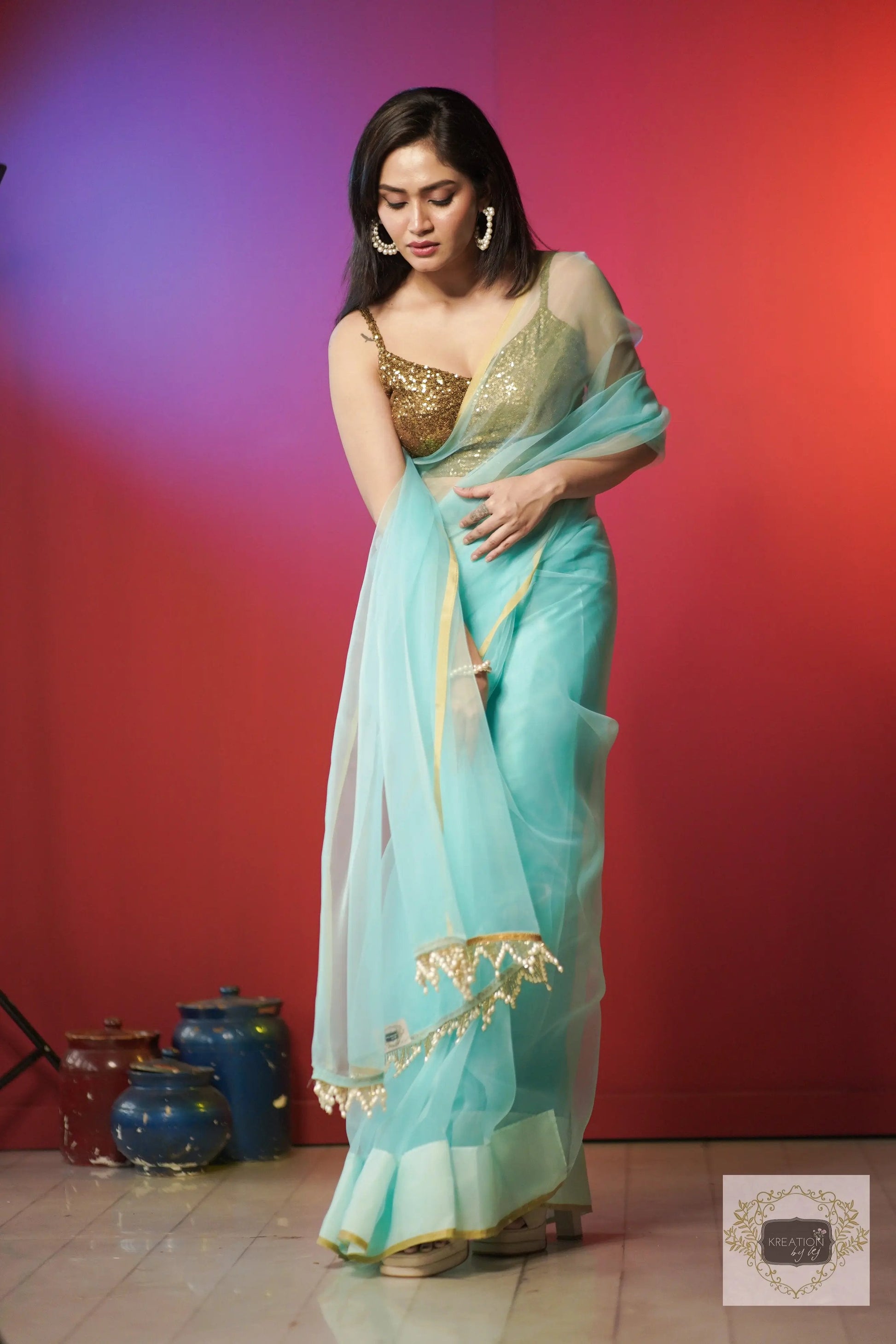 Ice Blue Organza Saree With Handmade Tassels On Pallu kreationbykj