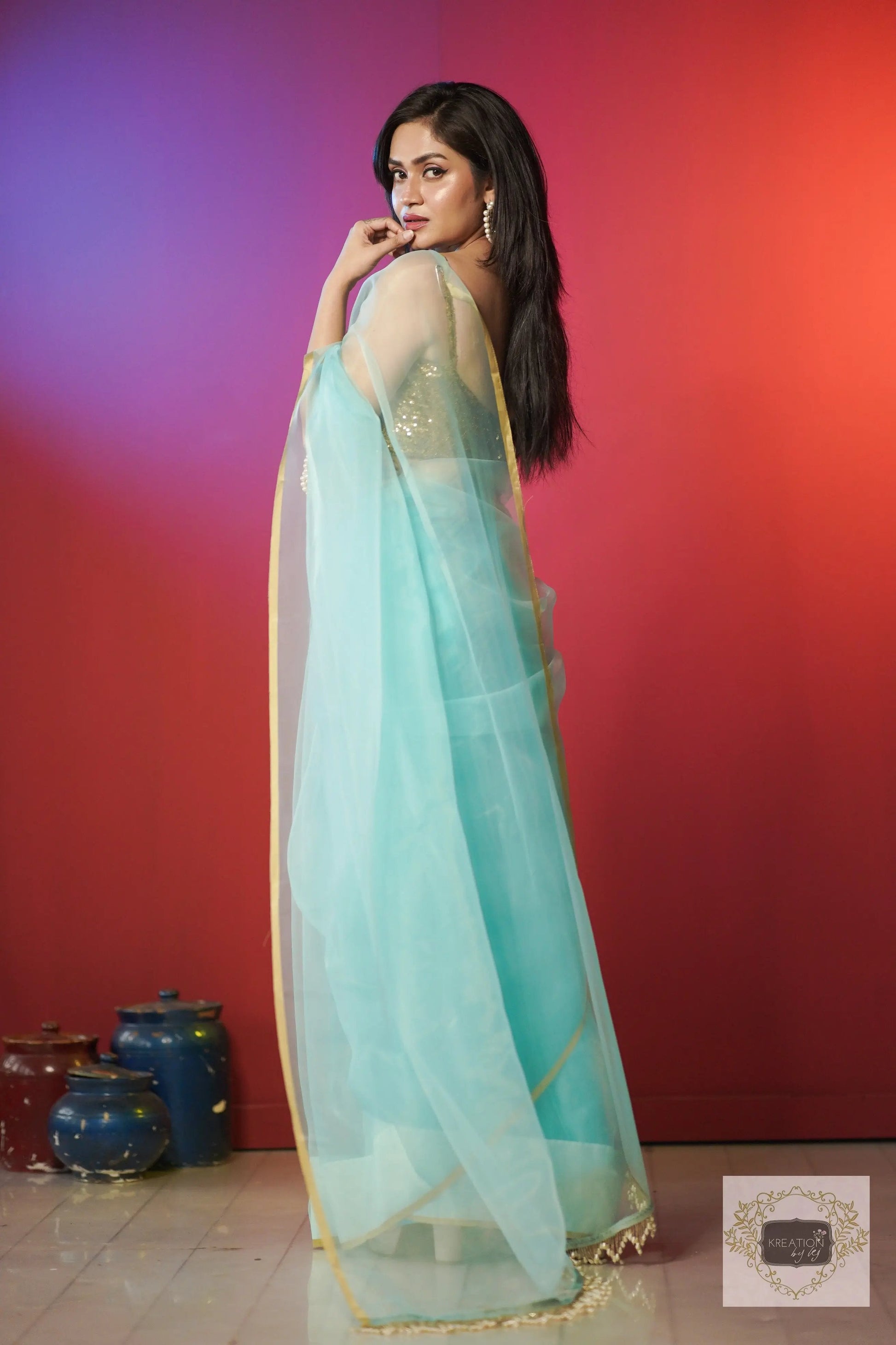 Ice Blue Organza Saree With Handmade Tassels On Pallu kreationbykj