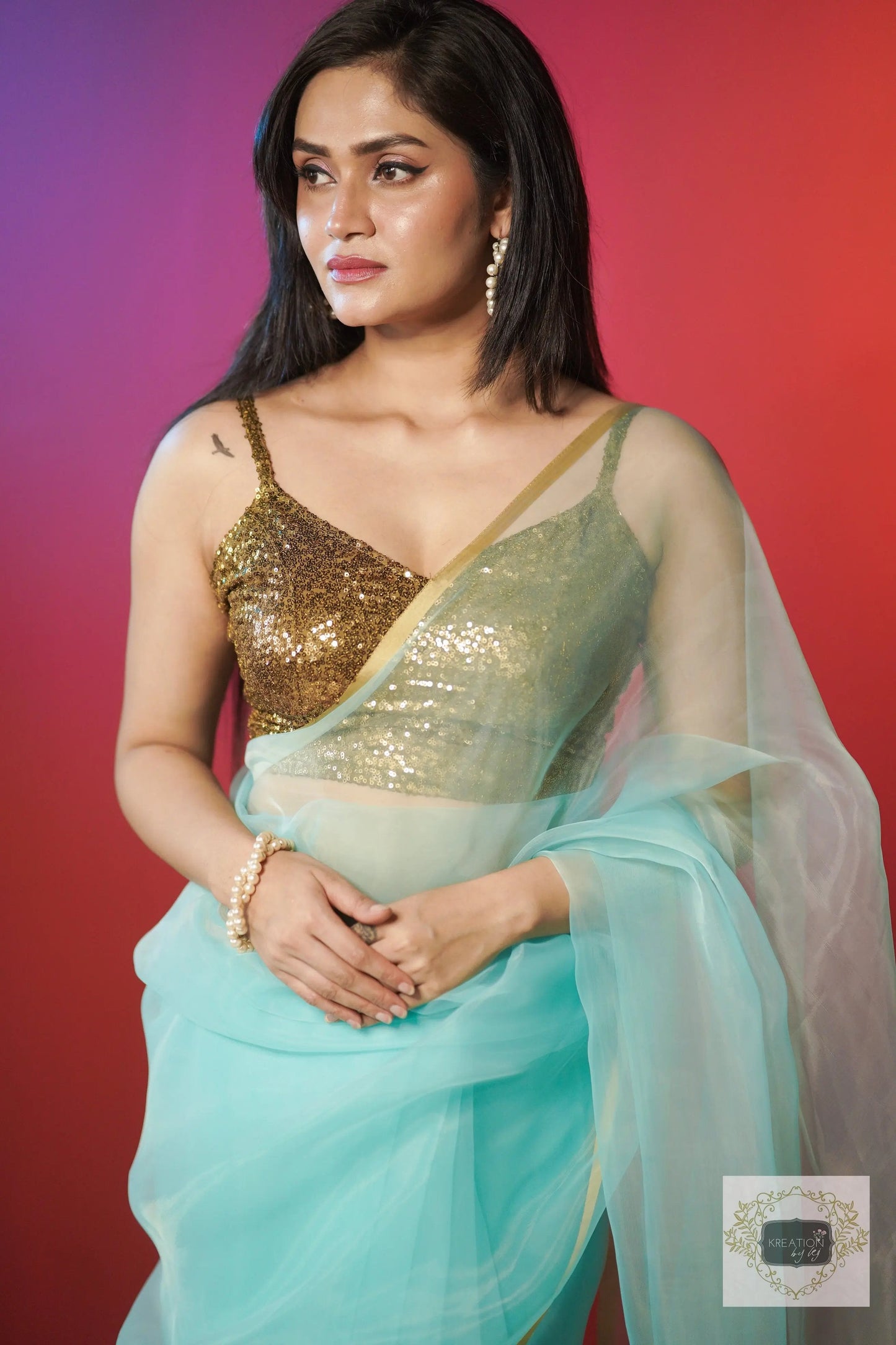 Ice Blue Organza Saree With Handmade Tassels On Pallu kreationbykj